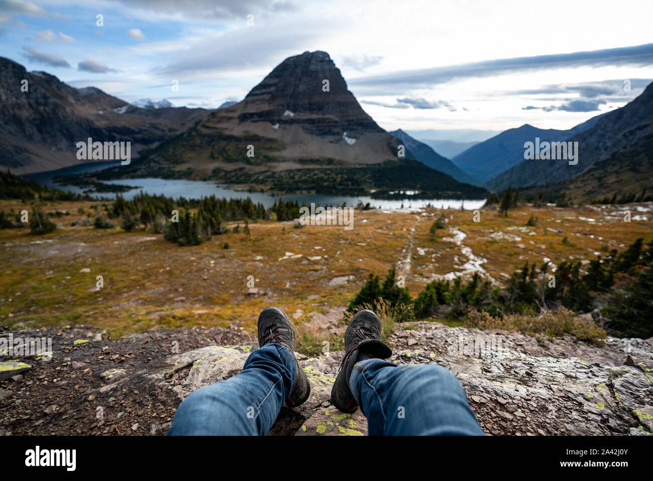 Photo from the Point of view of the photographer sitting down at the viewpoint at Hidden Lake, Montana. Stock Photo