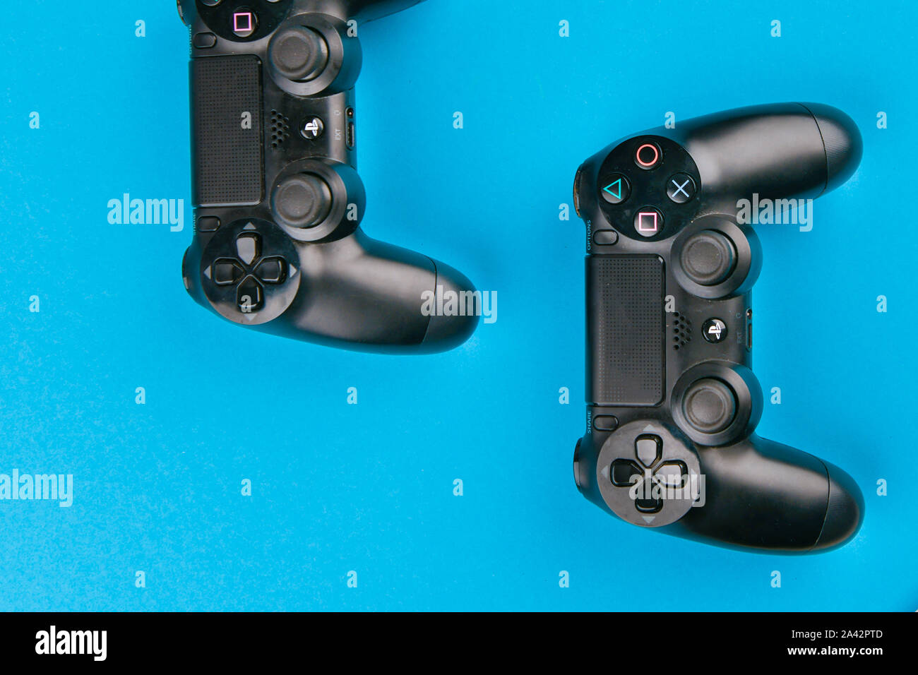 game joystick. playstation. on a blue background top view. The new Sony Dualshock 4 with