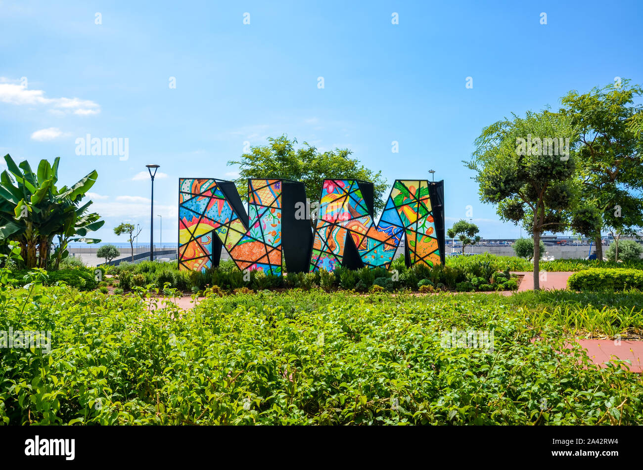 Funchal, Madeira, Portugal - Sep 10 2019: Nelson Mandela Memorial in the capital of the Portuguese island. Colorful initials N.M. of the former South African leader. South Africa, president, politics. Stock Photo