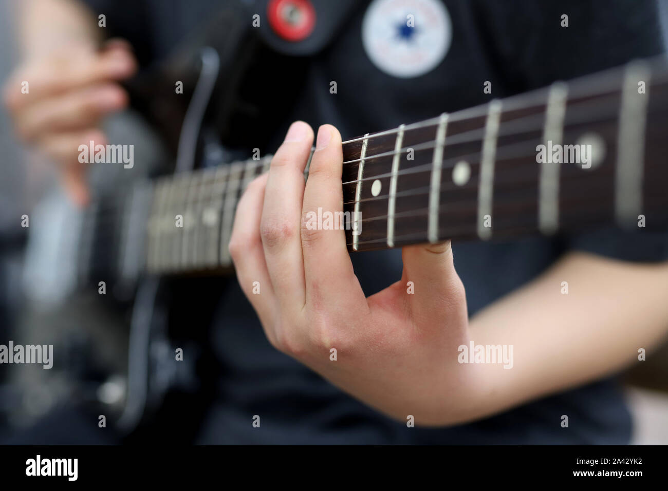 musician playing the guitar Stock Photo