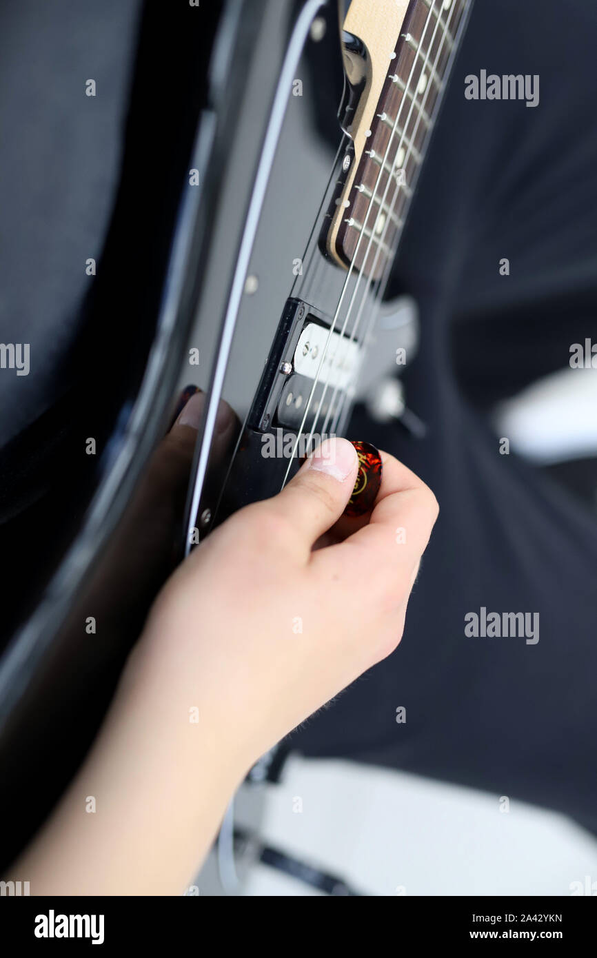 musician playing the guitar Stock Photo