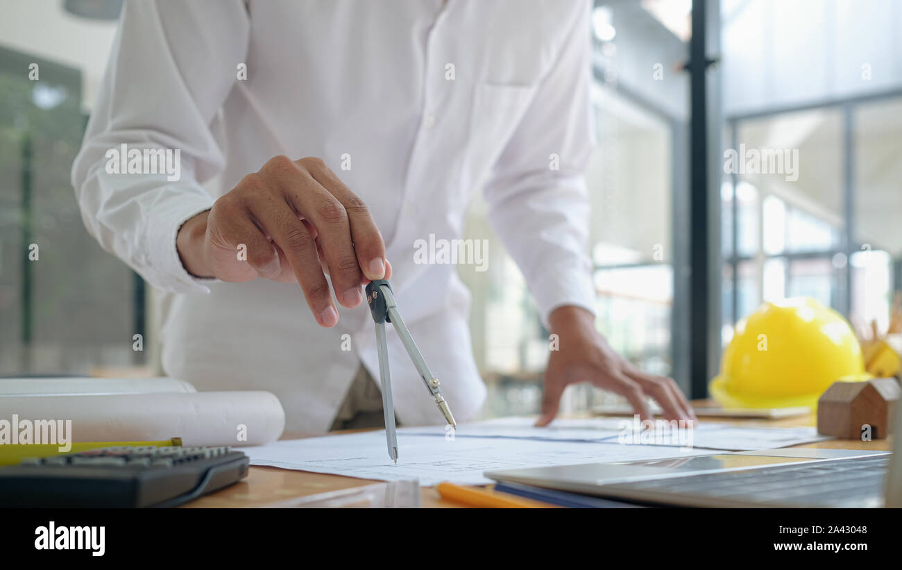 Architect or engineer working in office, Construction concept ...