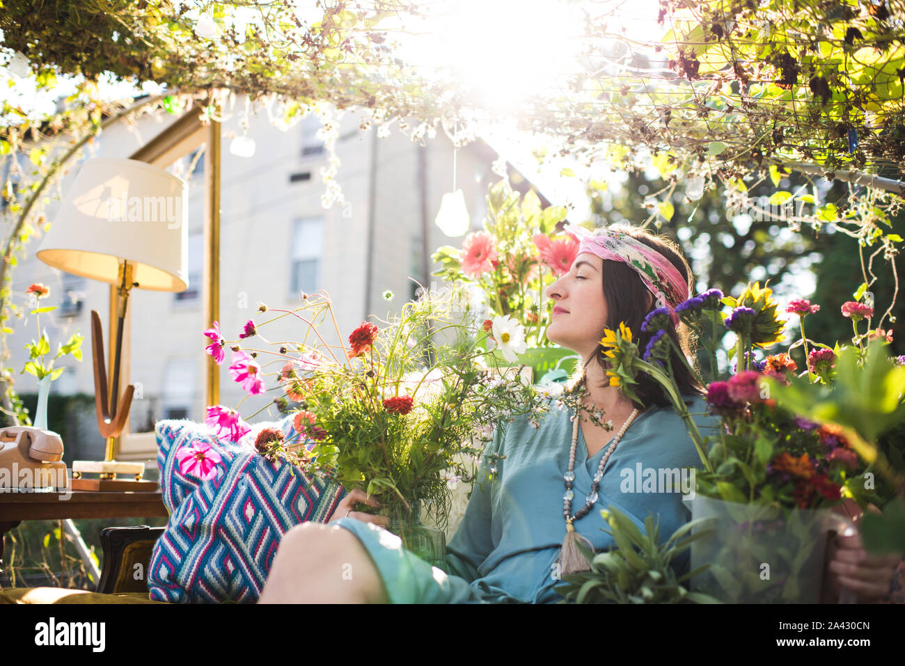 peaceful woman in a vintage styled garden Stock Photo