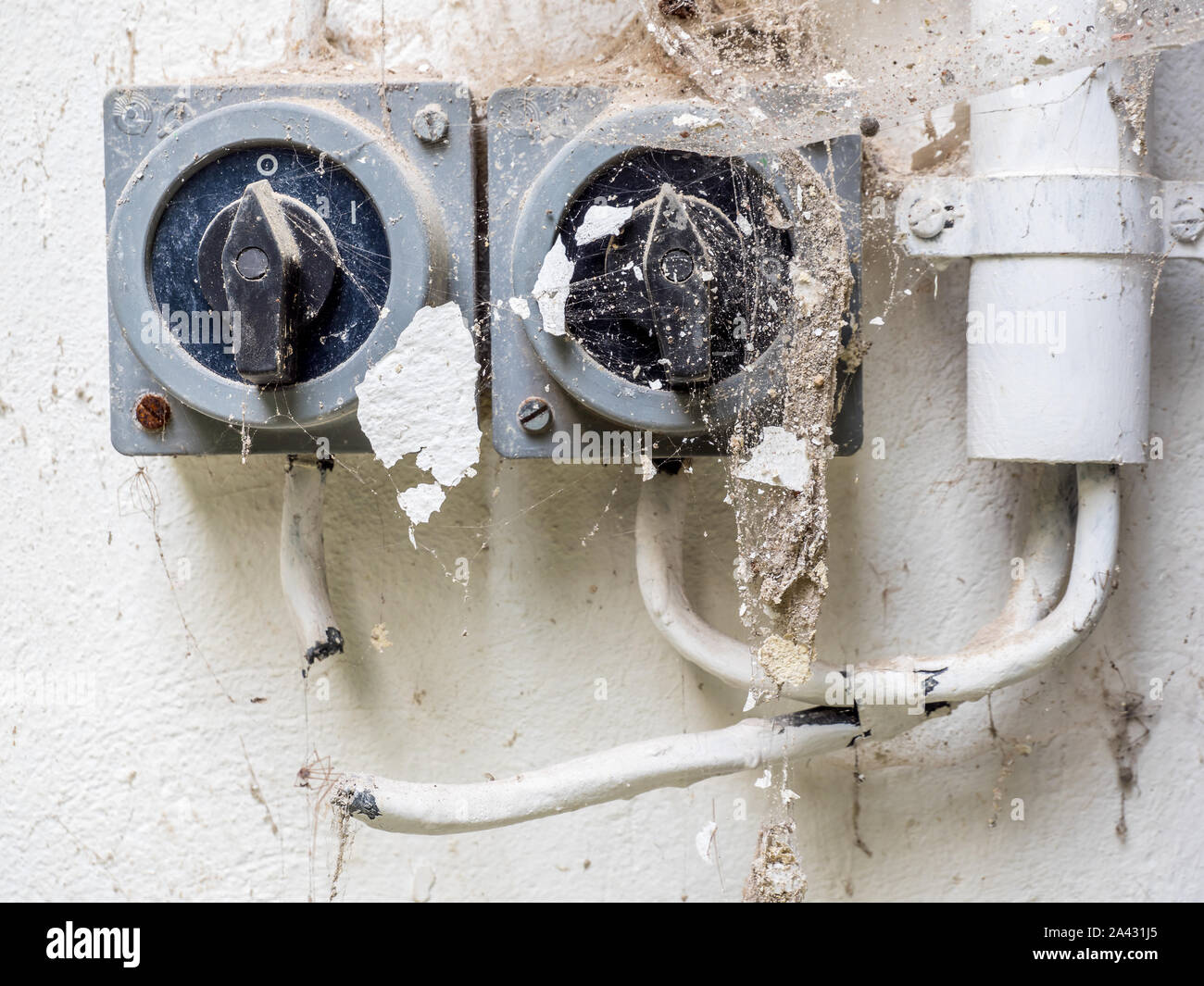 Old switch on a wall Stock Photo