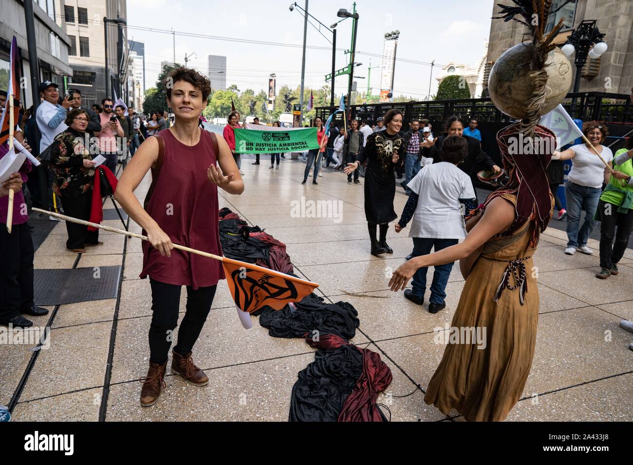 People are seen dancing on Calle Madero in the centre of Mexico City.  The dance is performed to represent Mother Earth and her fight against the elements.  Lexie Harrison-Cripps Stock Photo