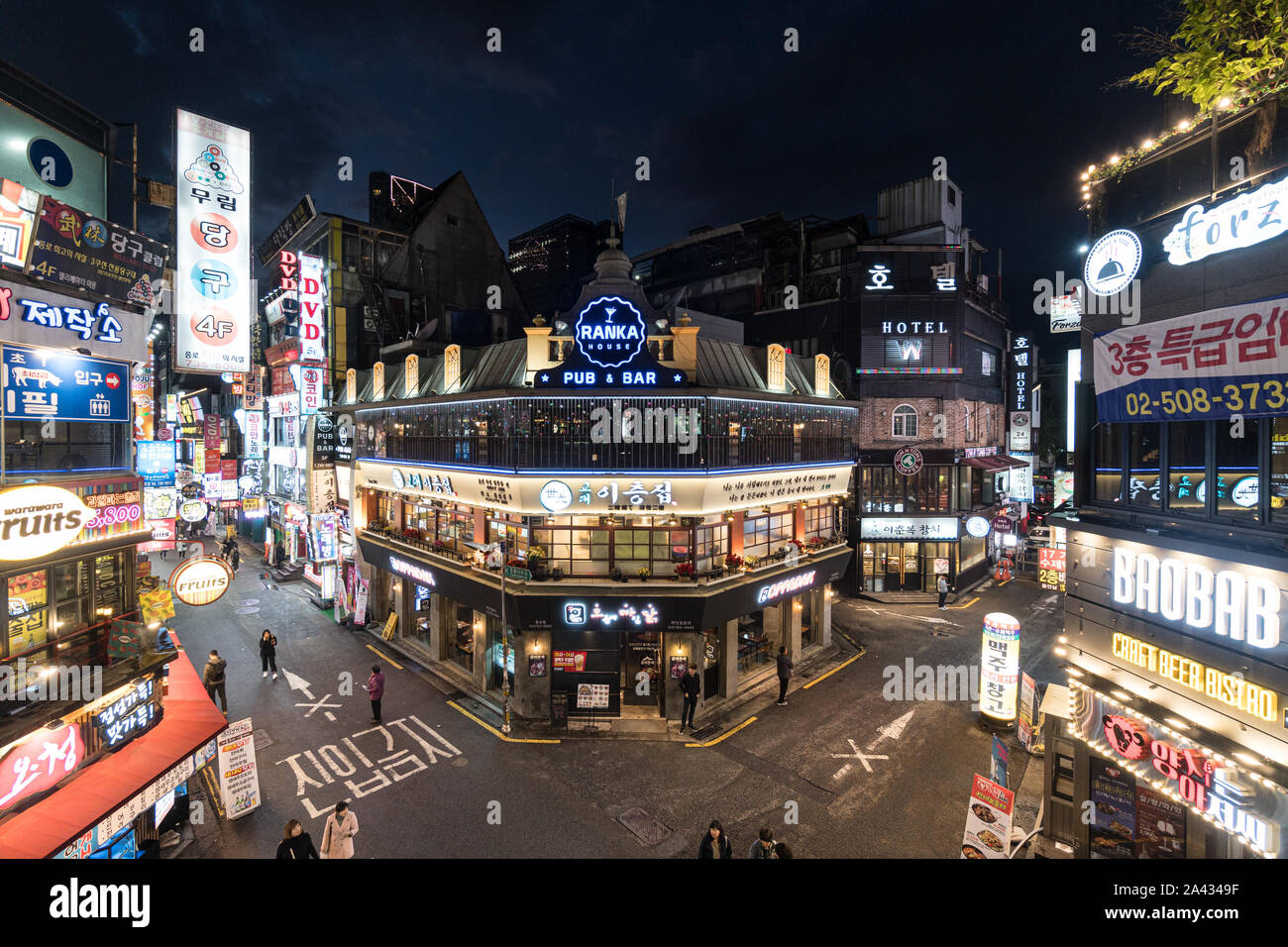 Seoul, South Korea - 3 November 2019: People walk the streets of Insadong nightlife district filled with bar and restaurant. Stock Photo