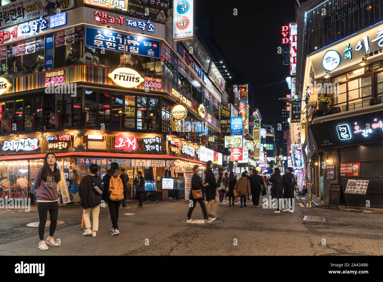 Seoul, South Korea - 3 November 2019: People walk the streets of Insadong nightlife district filled with bar and restaurant. Stock Photo