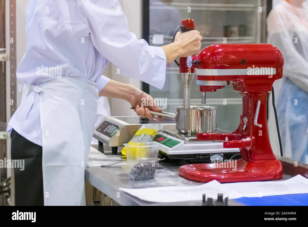 Professional chef workplace with modern food mixer at cuisine of