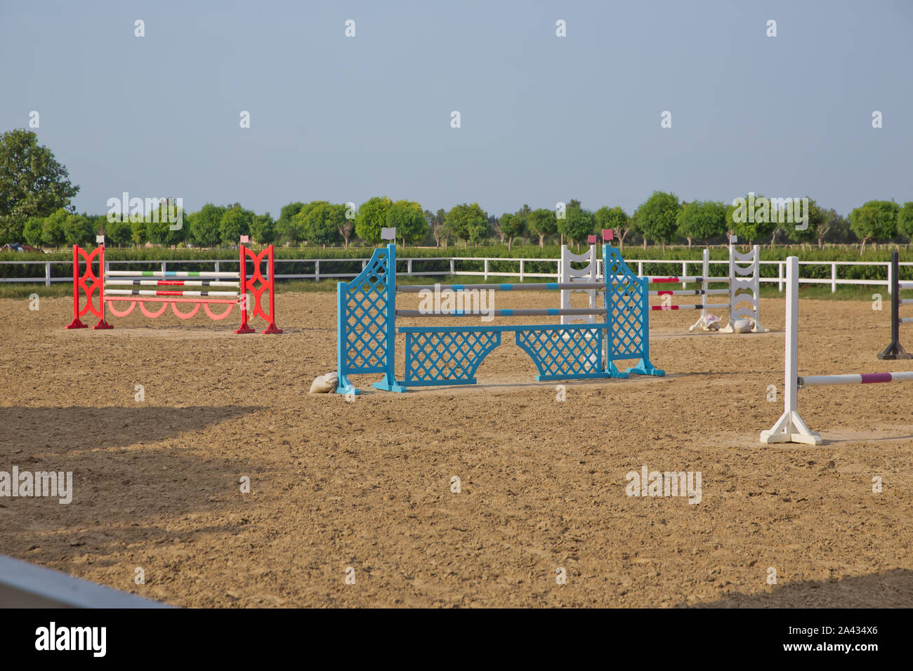 Horse agility track with jump obstacles for equestrian sports . Image of show jumping poles on