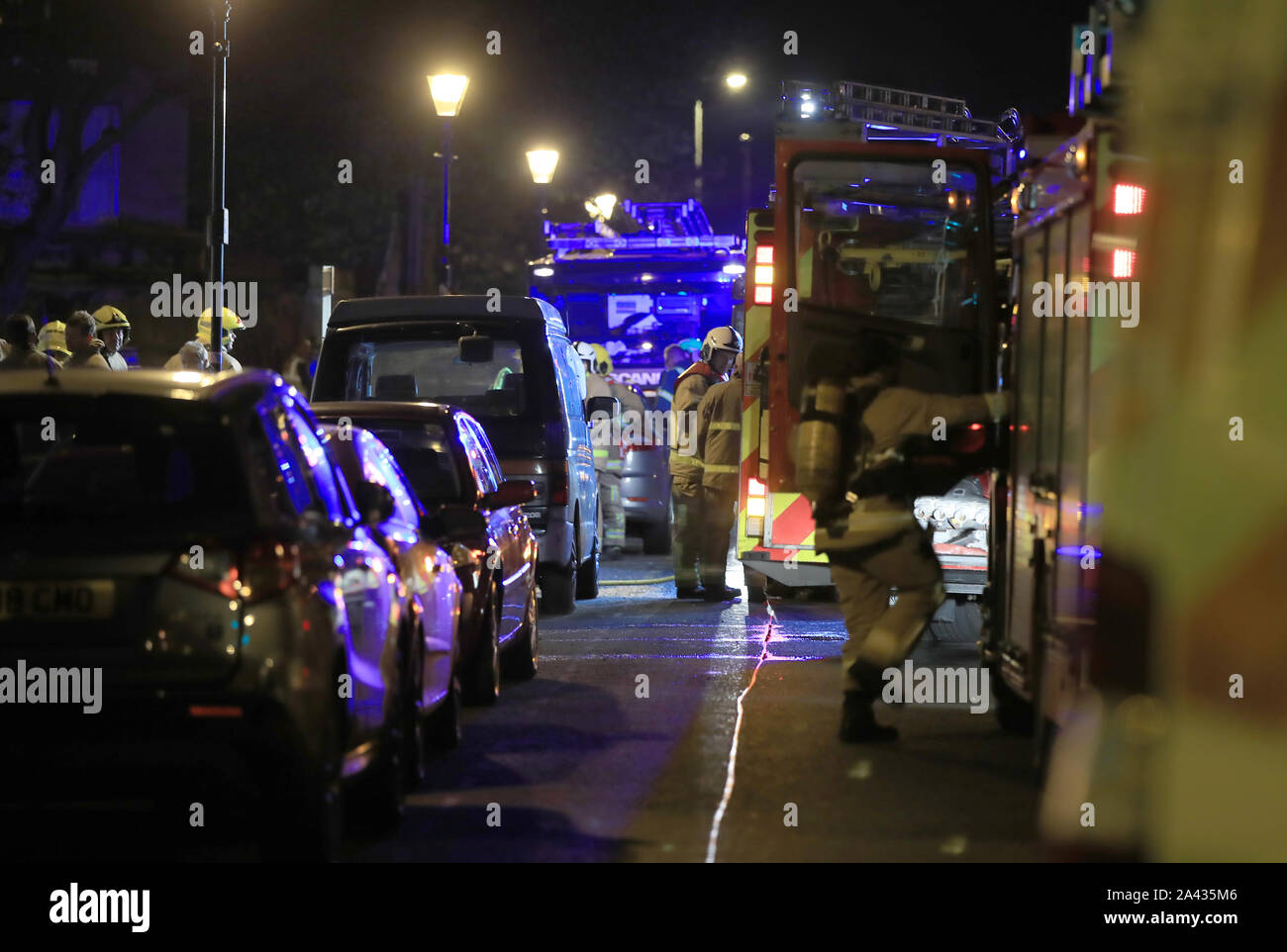 Emergency personnel in the street after a fire at the Rodney House care