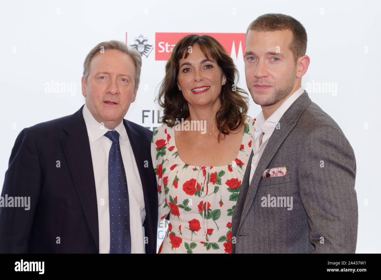 Cologne, Germany. 11th Oct, 2019. The actors Neil Dudgeon, Fiona Dolman and Nick Hendrix (l-r) come to screen the first episode of the 21st season of the crime series 'Inspector Barneby' as part of the Film Festival Cologne 2019. Credit: Henning Kaiser/dpa/Alamy Live News Stock Photo
