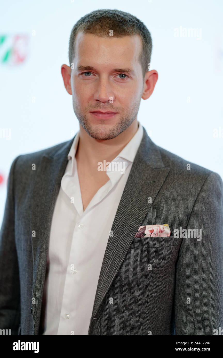 Cologne, Germany. 11th Oct, 2019. The actor Nick Hendrix comes to a screening of the first episode of the 21st season of the crime series 'Inspector Barneby' as part of the Film Festival Cologne 2019. Credit: Henning Kaiser/dpa/Alamy Live News Stock Photo
