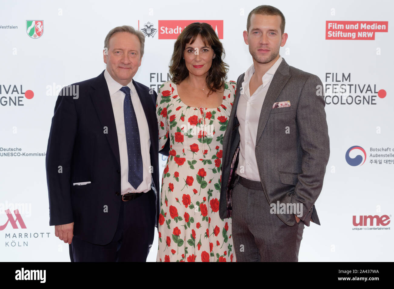 Cologne, Germany. 11th Oct, 2019. The actors Neil Dudgeon, Fiona Dolman and Nick Hendrix (l-r) come to screen the first episode of the 21st season of the crime series 'Inspector Barneby' as part of the Film Festival Cologne 2019. Credit: Henning Kaiser/dpa/Alamy Live News Stock Photo