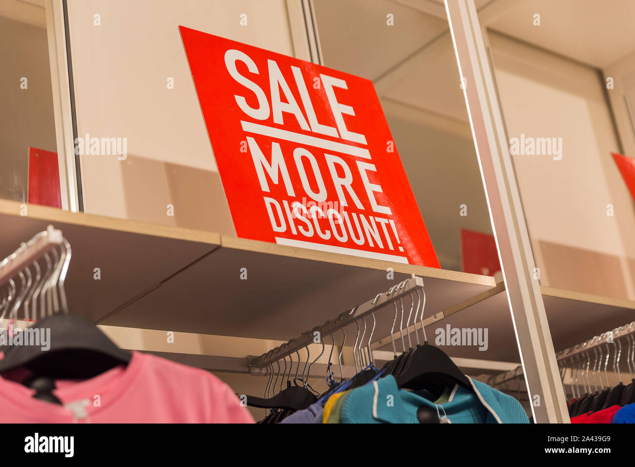 The inscription in the store with the word Sale Stock Photo