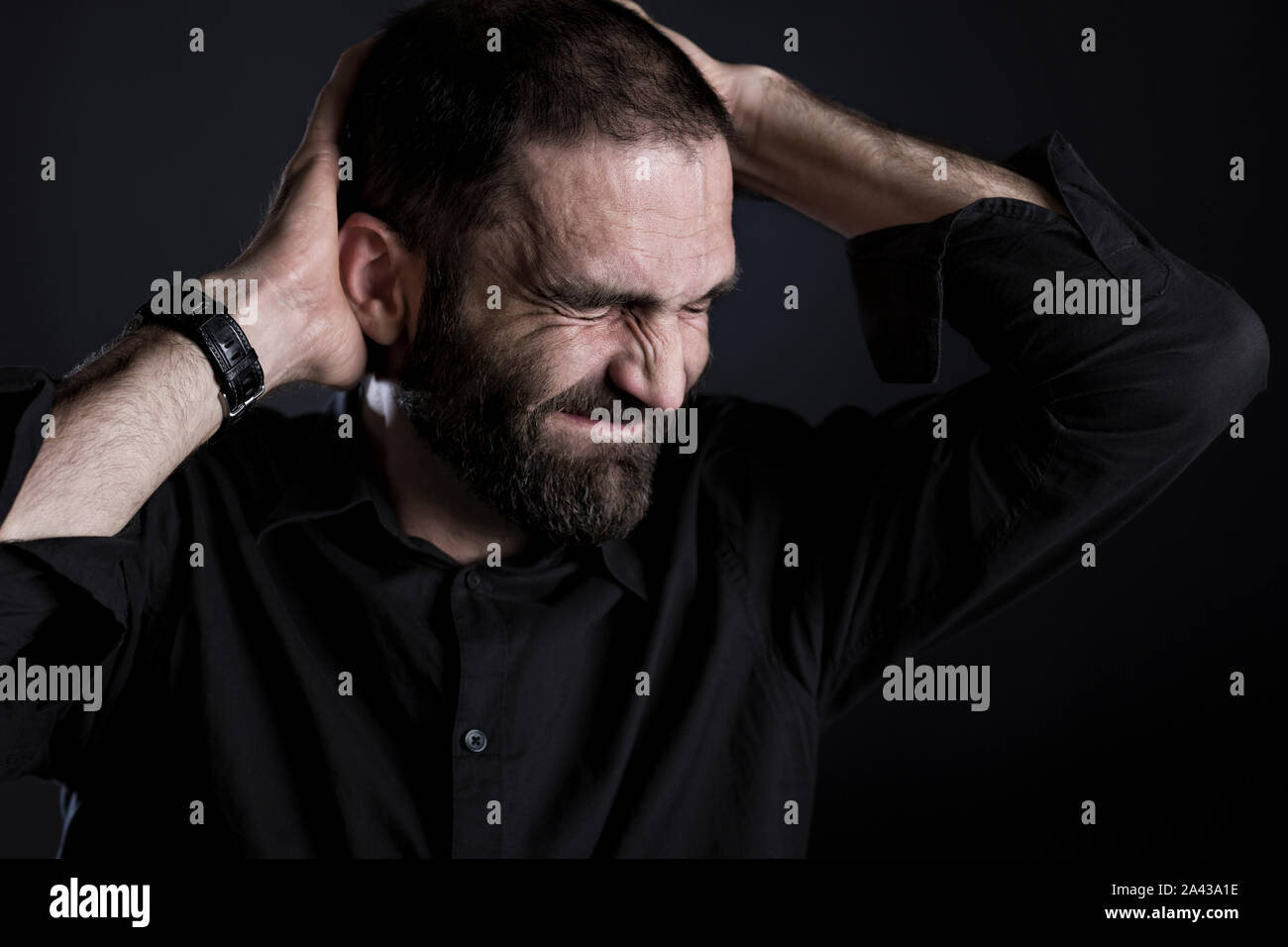 Frustrated man looking miserable and despaired. Stock Photo