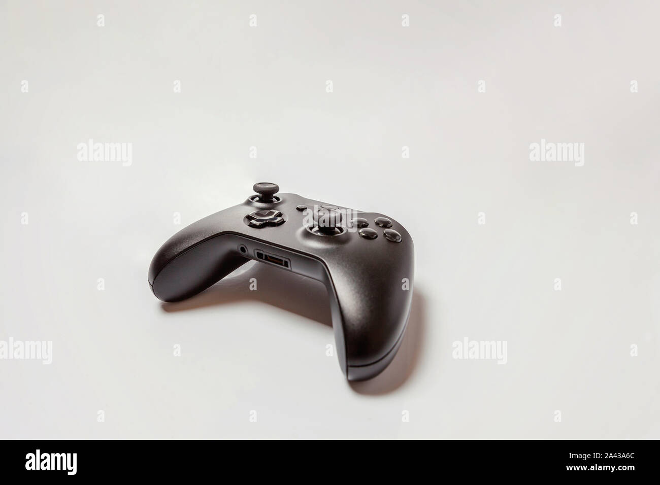 Black joystick gamepad, game console isolated on white background ...