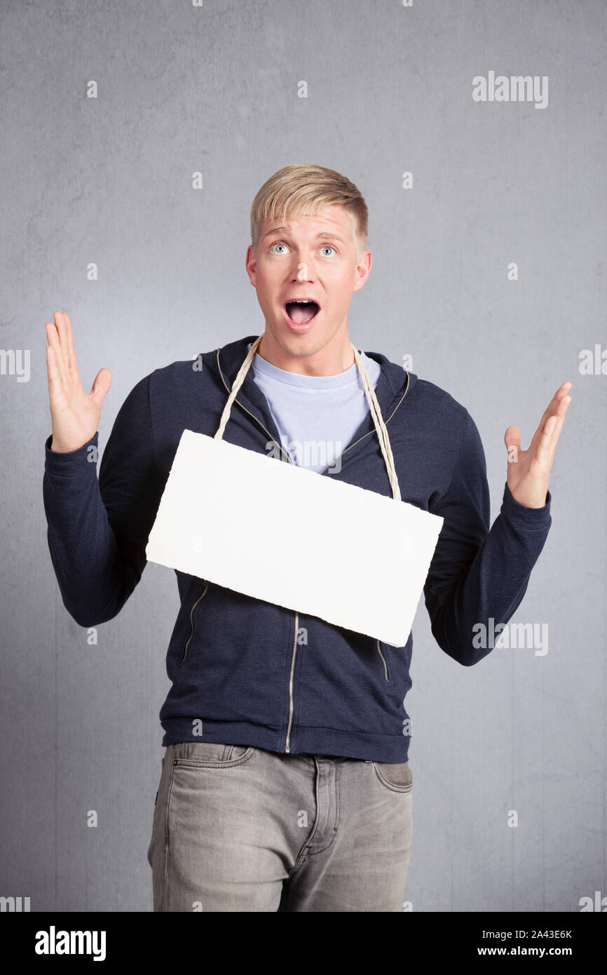 Shocked man showing white hi-res stock photography and images - Alamy