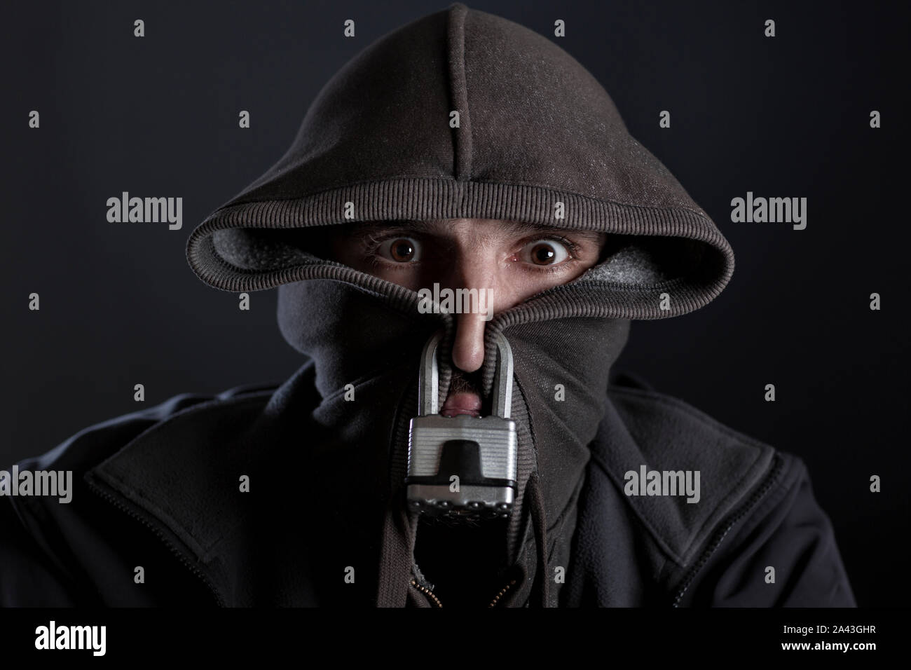Dark man with hood up hi-res stock photography and images - Alamy