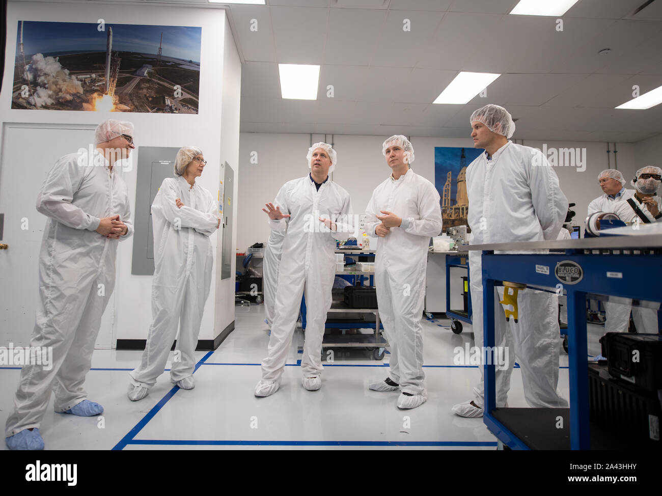 Hawthorne, United States of America. 10 October, 2019. NASA Administrator Jim Bridenstine, center, wears a bunny suit as he visits a clean room and speaks with employees during a tour of the SpaceX headquarters October 10, 2019 in Hawthorne, California. Credit: Aubrey Gemignani/NASA/17�Թ����� Live News Stock Photo