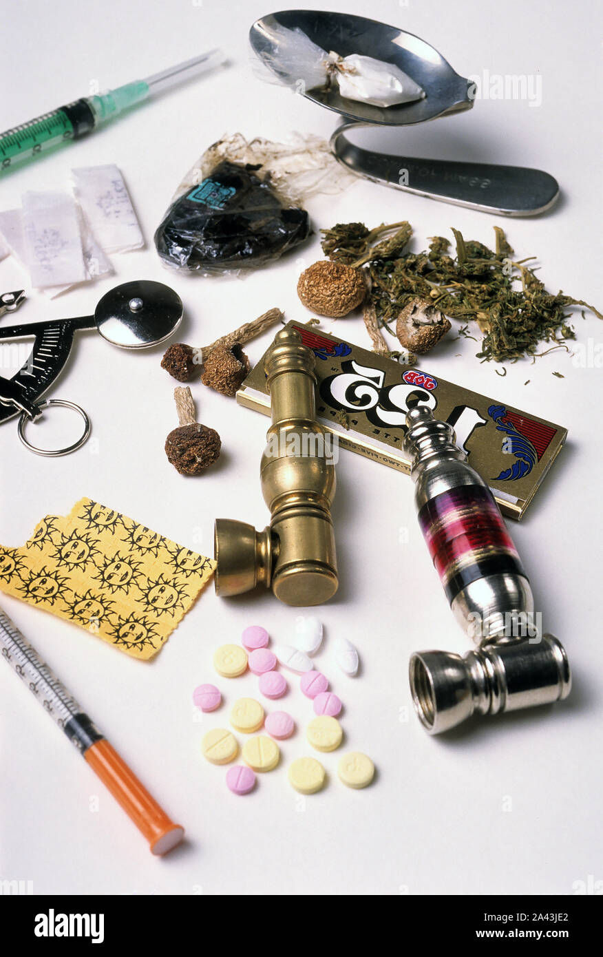 Illicit drugs and paraphernalia on display Stock Photo