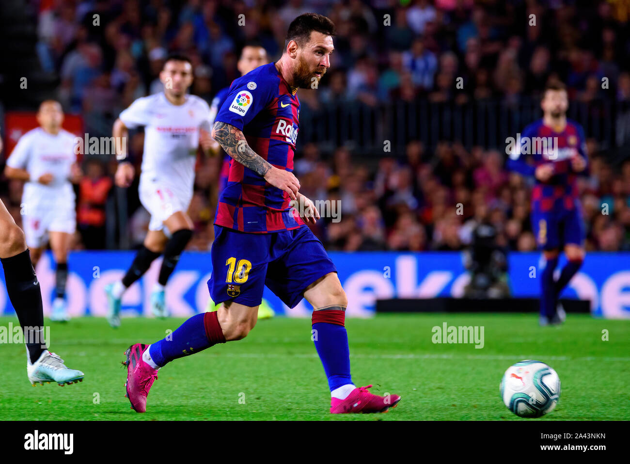 BARCELONA - OCT 6: Lionel Messi plays at the La Liga match between FC Barcelona and Sevilla FC at the Camp Nou Stadium on October 6, 2019 in Barcelona Stock Photo