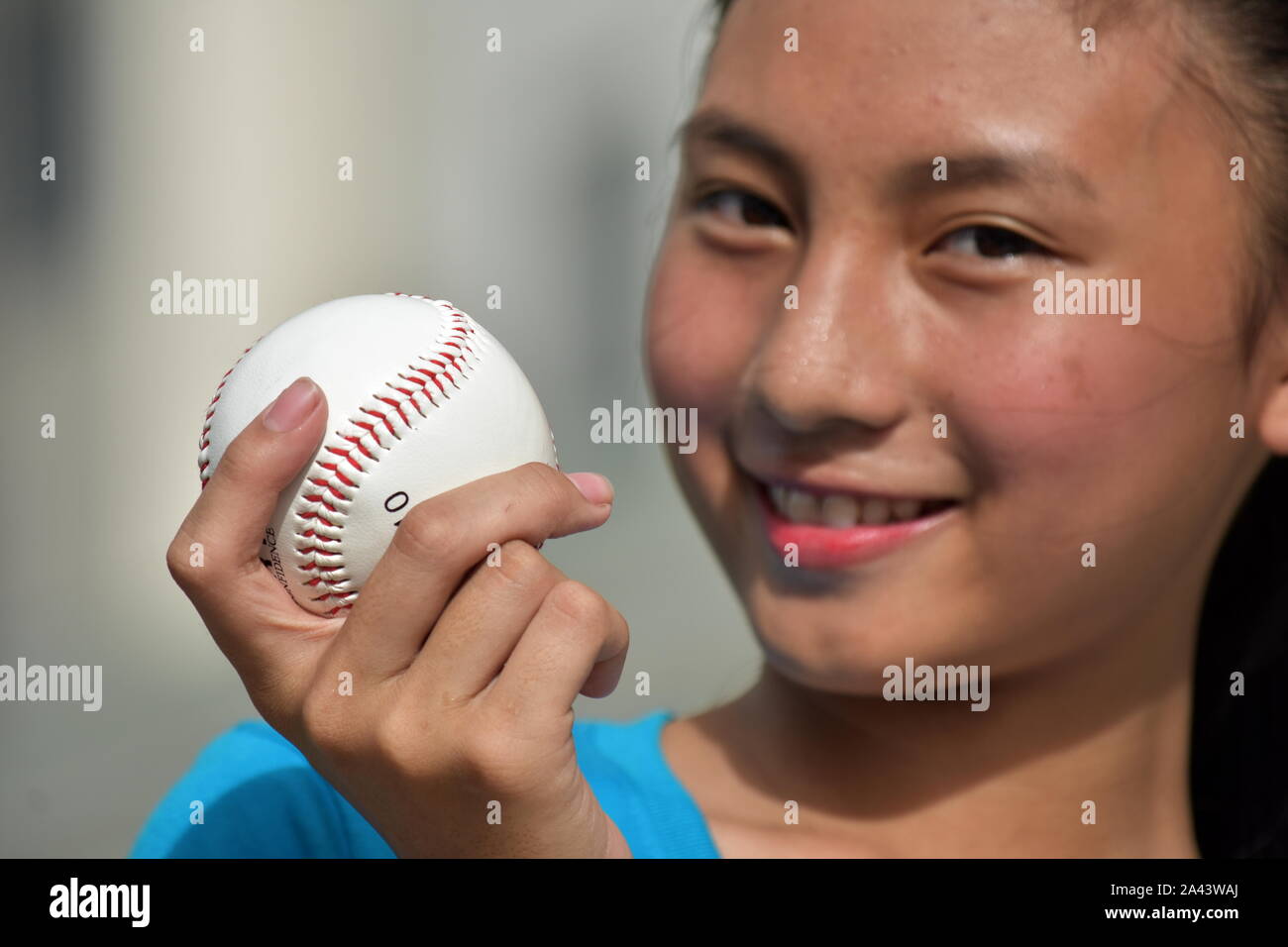 Asian Female Baseball Player And Happiness Stock Photo Alamy