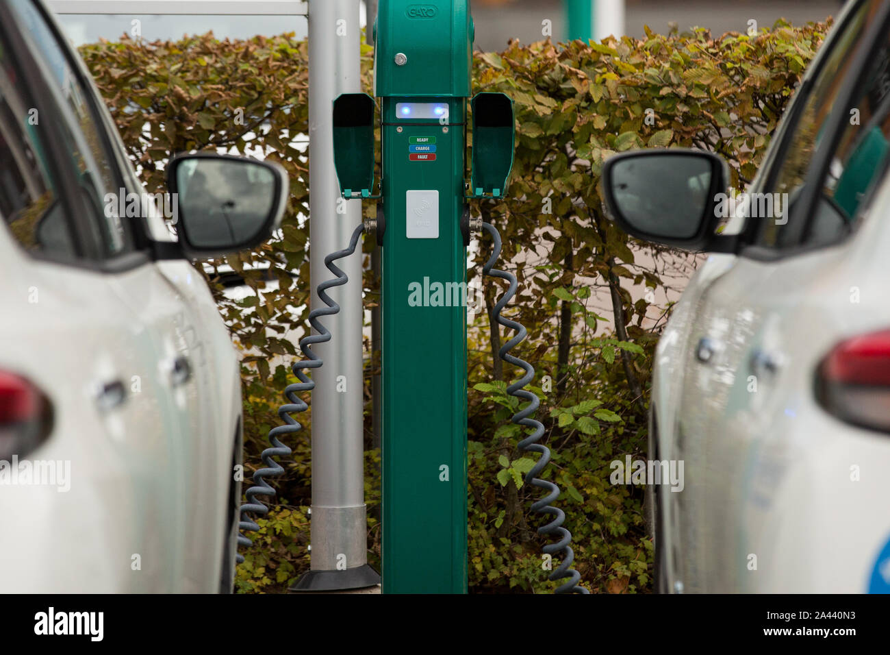 Electric vehicles connected to the charger seen in Lindholmen Science in Gothenburg. Stock Photo