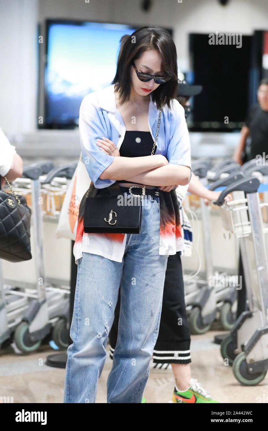 Chinese singer and actress Victoria Song or Song Qian arrives at the Beijing Capital International Airport after landing in Beijing, China, 17 August Stock Photo