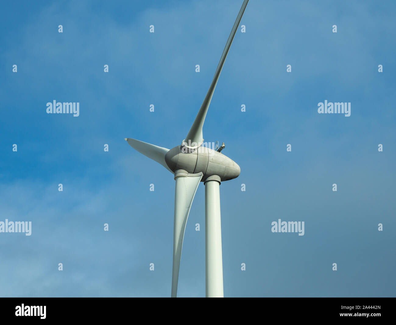 Detail of wind turbine. Close-up to the generator and base of the wind turbines. Renewable energy. Electrical windmills. France countryside Stock Photo