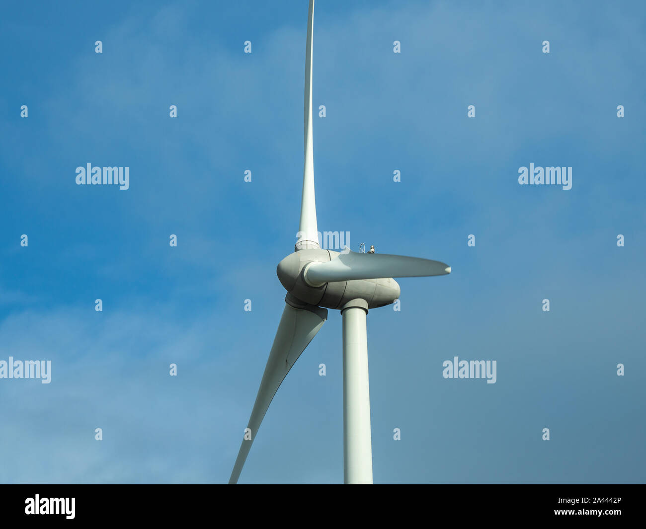 Detail of wind turbine. Close-up to the generator and base of the wind turbines. Renewable energy. Electrical windmills. France countryside Stock Photo