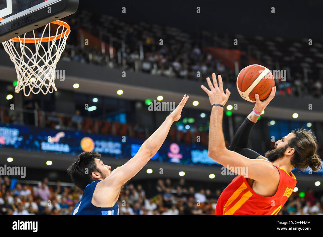 Ricky Rubio, right, of Spain men's national basketball team challenges