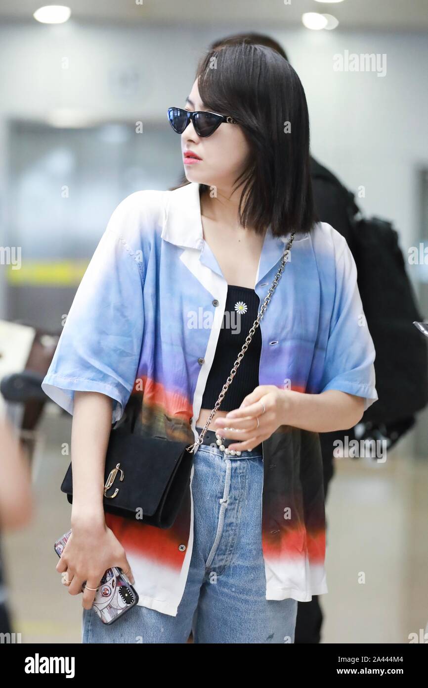 Chinese singer and actress Victoria Song or Song Qian arrives at the Beijing Capital International Airport after landing in Beijing, China, 17 August Stock Photo