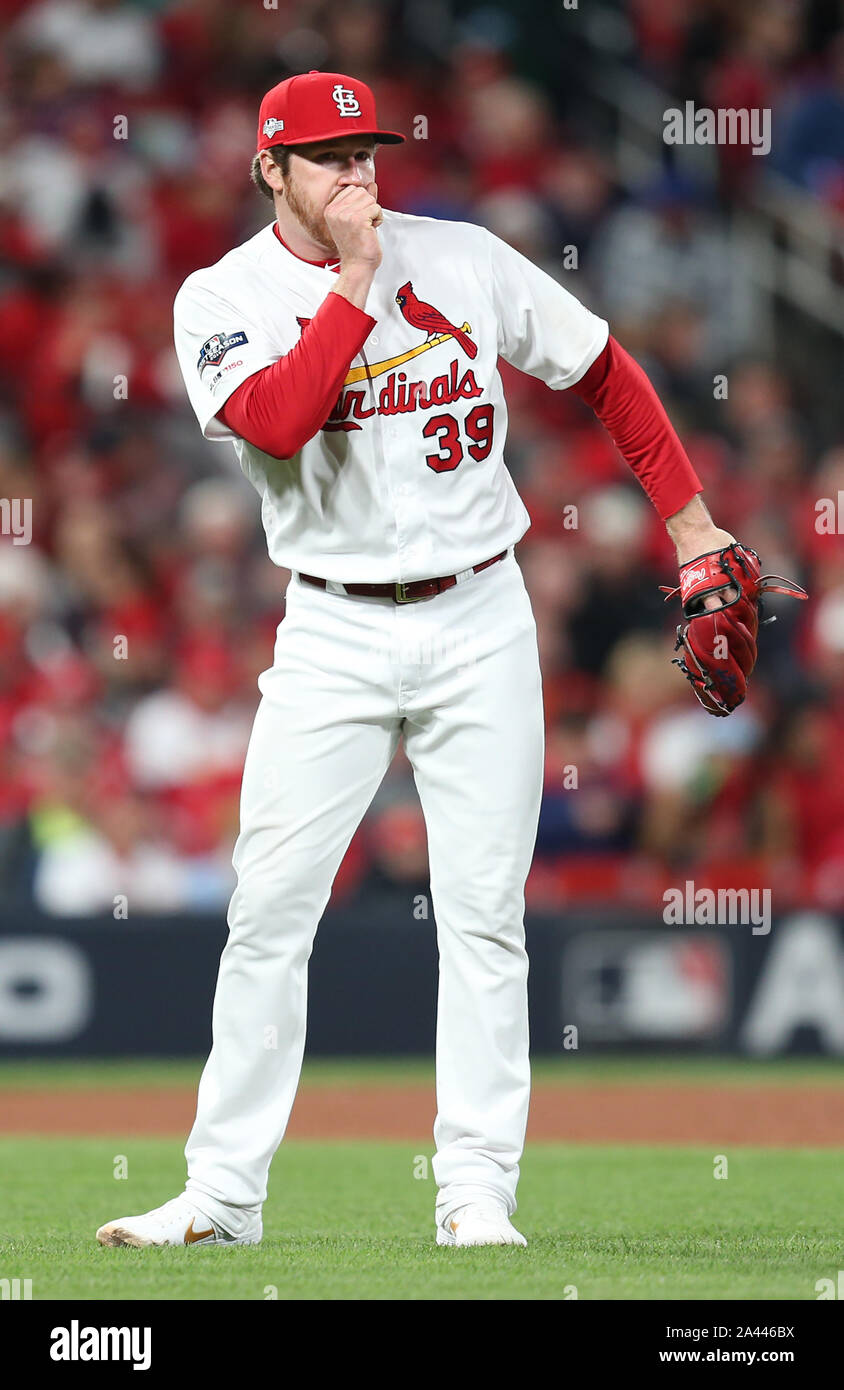Miles Mikolas of the St. Louis Cardinals wears socks honoring Armed News  Photo - Getty Images