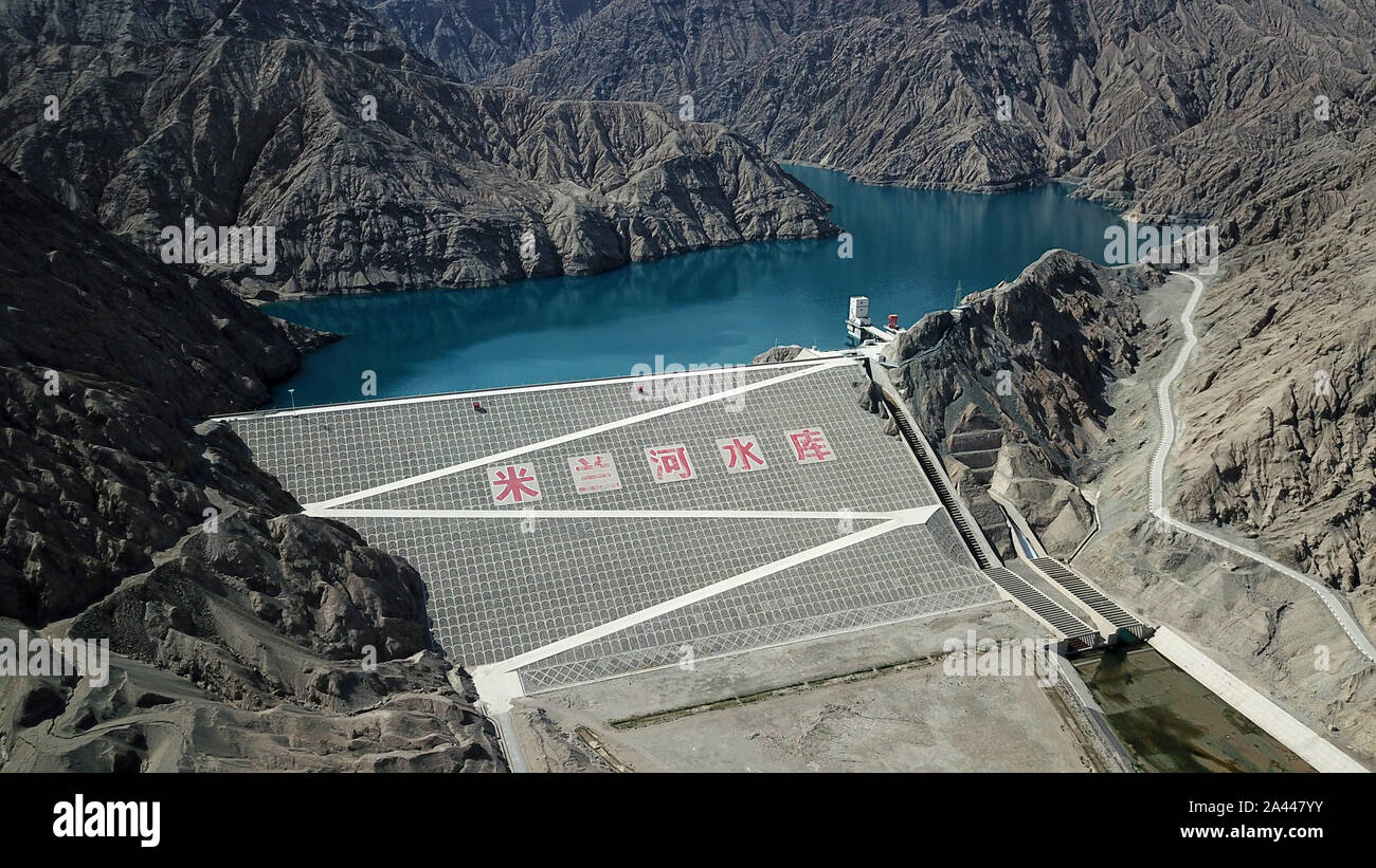 An aerial view of Milan River Reservoir, which was constructed in 2011 and is capable of generating over 10 million kWh annually, resembling a mountai Stock Photo