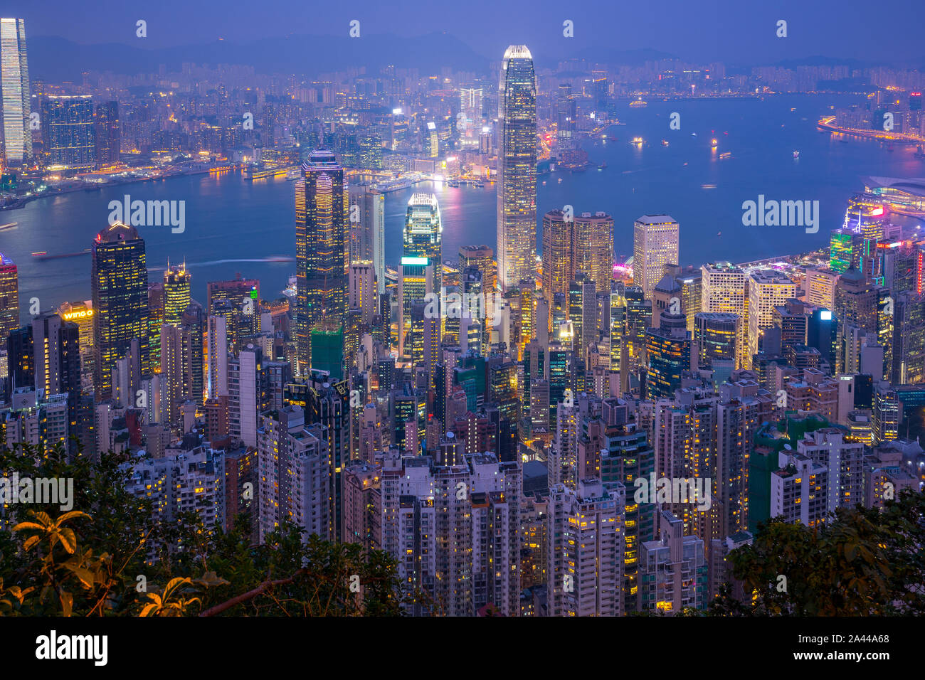 Hong Kong city skyline with landmark buildings at night in Hong Kong. Stock Photo