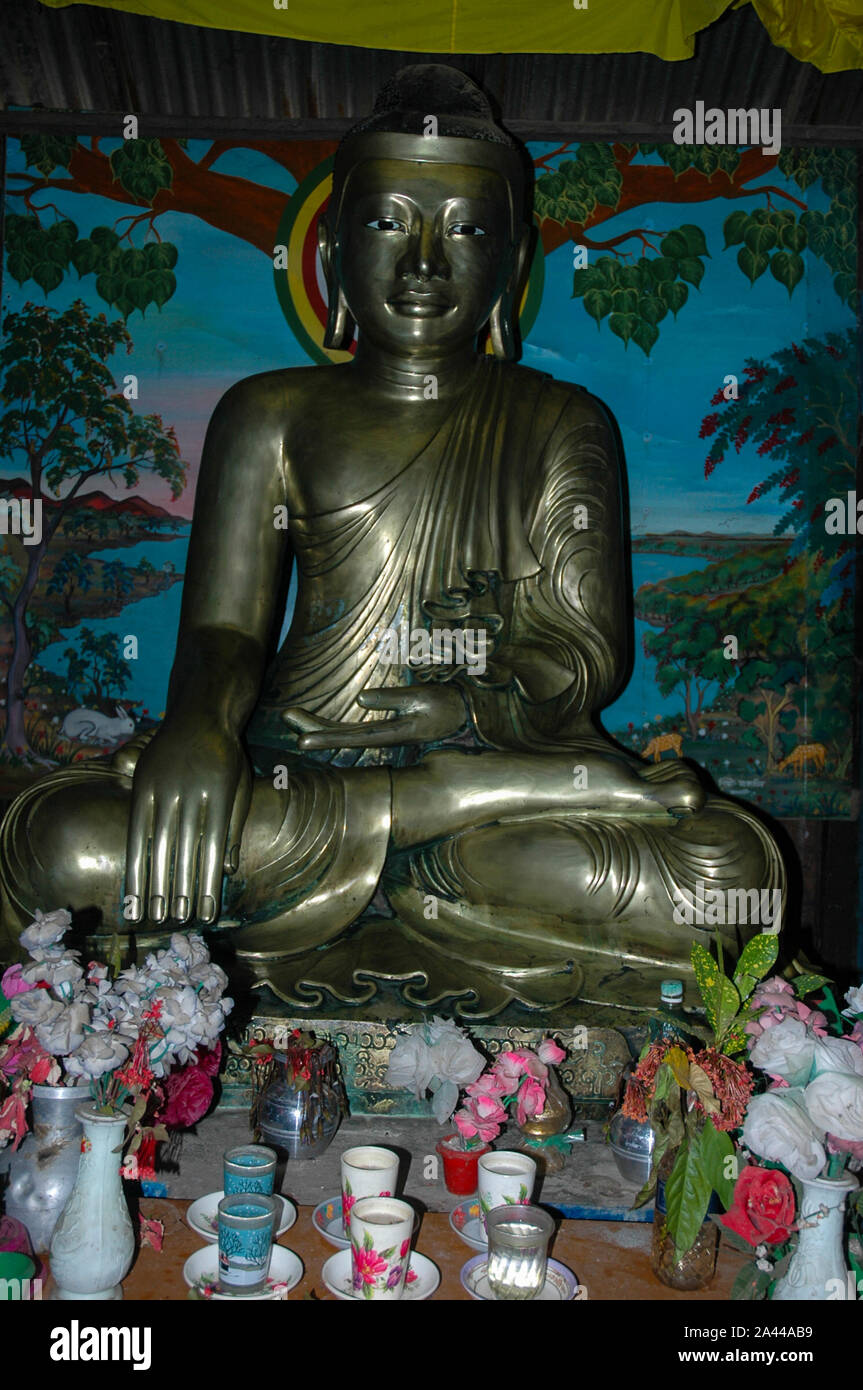 A bronze Buddha statue inside the Sima Buddhist Bihara at Kuakata in Patuakhali. Bangladesh. Stock Photo