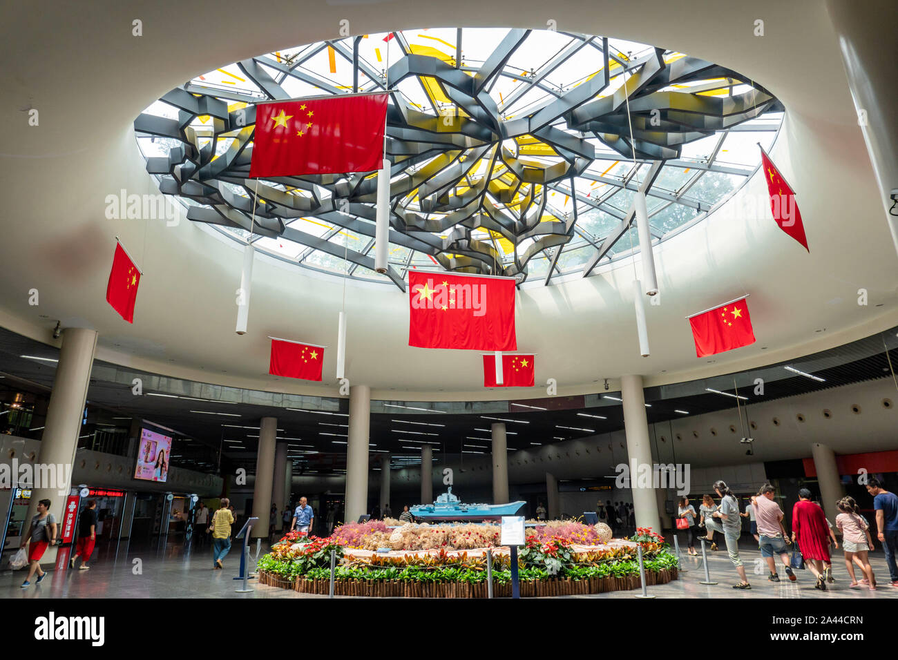 Seven national flags are hung to celebrate the 70th anniversary of the founding of the People's Republic of China at the People's Square subway statio Stock Photo
