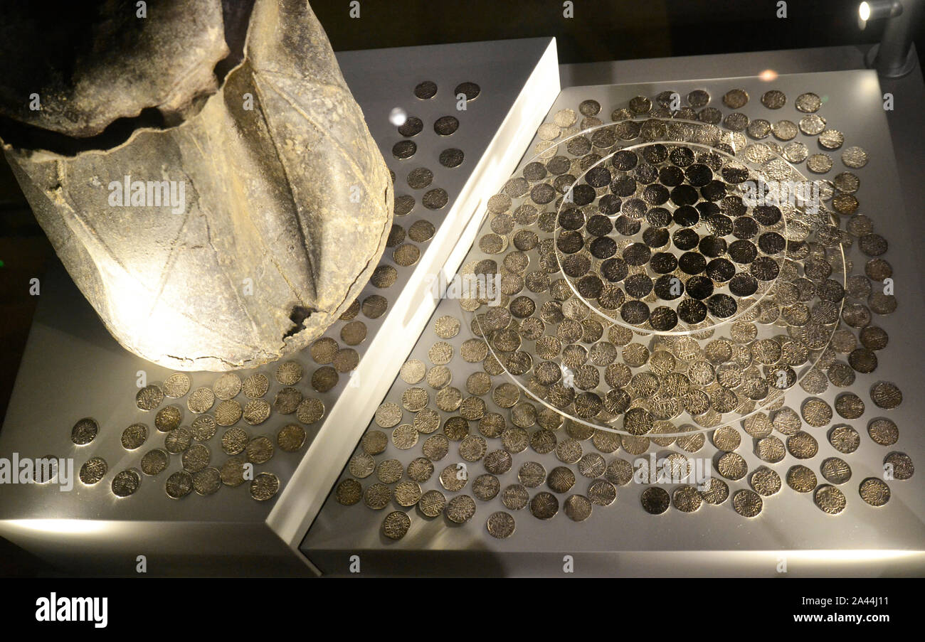 Hoard of 445 silver coins with lead cainster, associated with Colchester's Jewish community. Display at Colchester Castle Museum, Colchester, Essex UK Stock Photo