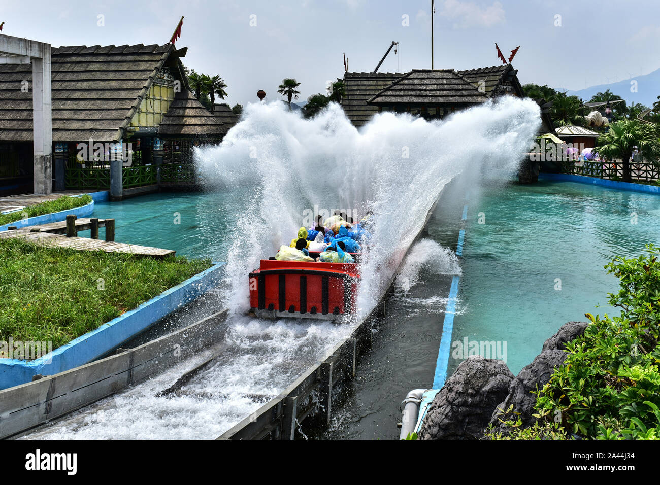 A rollar coaster with passengers is ''surfing'' in Guilin Merryland Theme Part in Guilin city, south China's Guangxi Zhuang Autonomous Region, 25 Augu Stock Photo