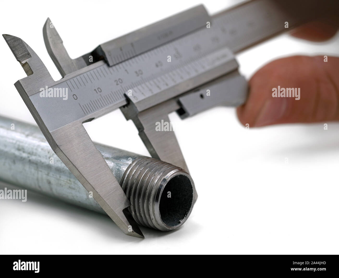 Precise measurement of a thread with a vernier caliper isolated on