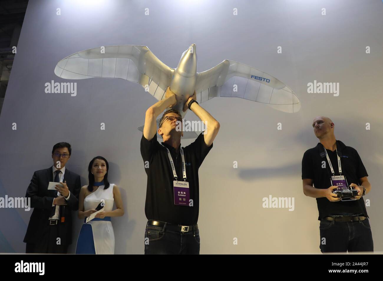 A bird-like drone developed by Festo is displayed during the 2019 Word Robot Conference (WRC) in Beijing, China, 20 August 2019.   The 2019 Word Robot Stock Photo