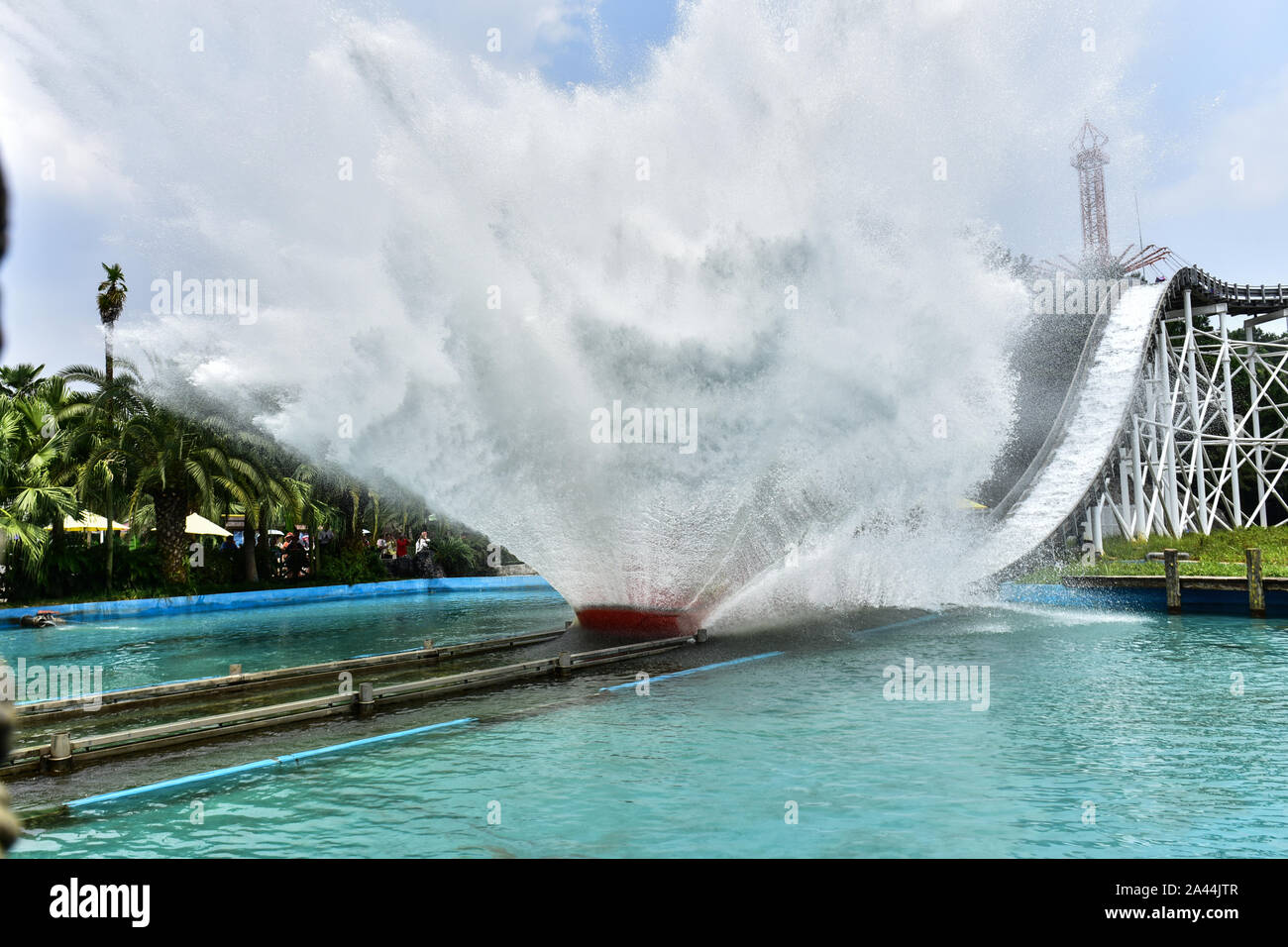 A rollar coaster with passengers is ''surfing'' in Guilin Merryland Theme Part in Guilin city, south China's Guangxi Zhuang Autonomous Region, 25 Augu Stock Photo