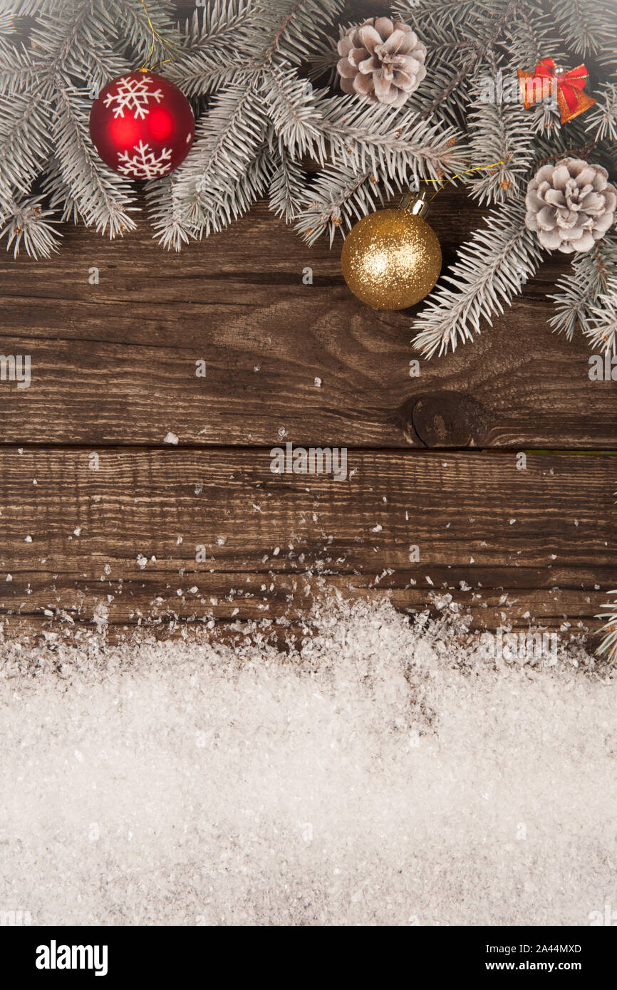 Christmas grunge wooden background with snow fir tree. Top view with ...