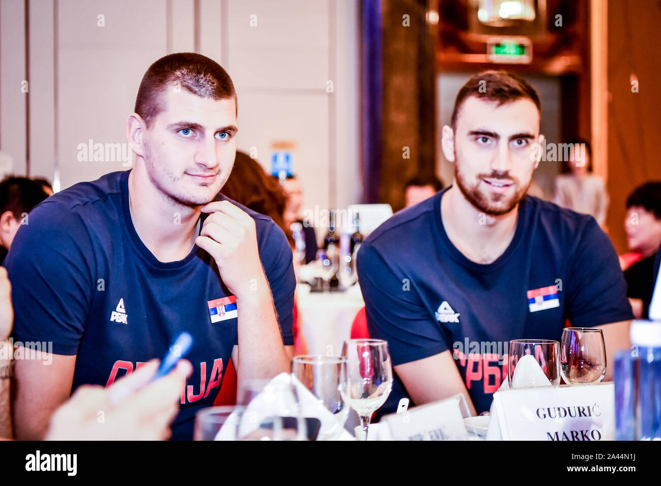 Nikola Jokic, left, a Serbian professional basketball player for the Denver Nuggets of the National Basketball Association, attends the welcome banque Stock Photo
