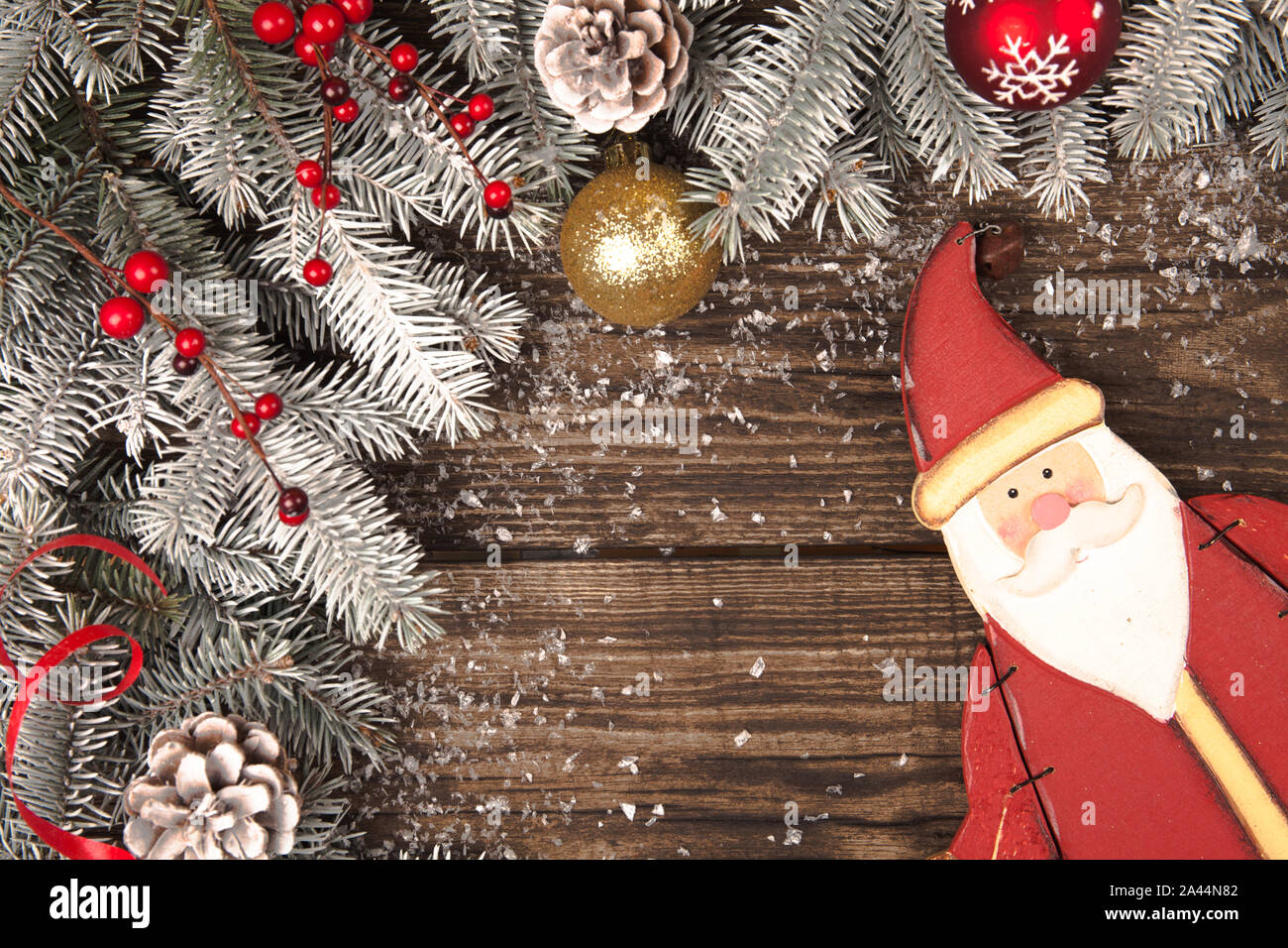Christmas grunge wooden background with snow fir tree. Top view with ...