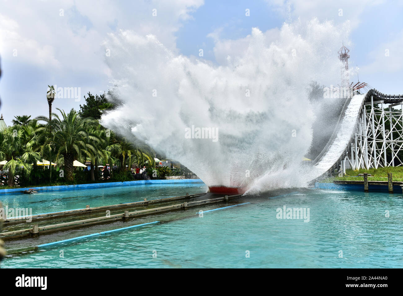 A rollar coaster with passengers is ''surfing'' in Guilin Merryland Theme Part in Guilin city, south China's Guangxi Zhuang Autonomous Region, 25 Augu Stock Photo