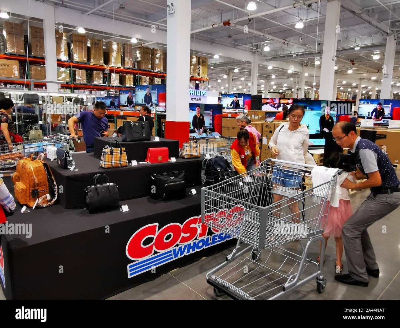 Chinese customers shop at the Costco store in Shanghai, China, 28