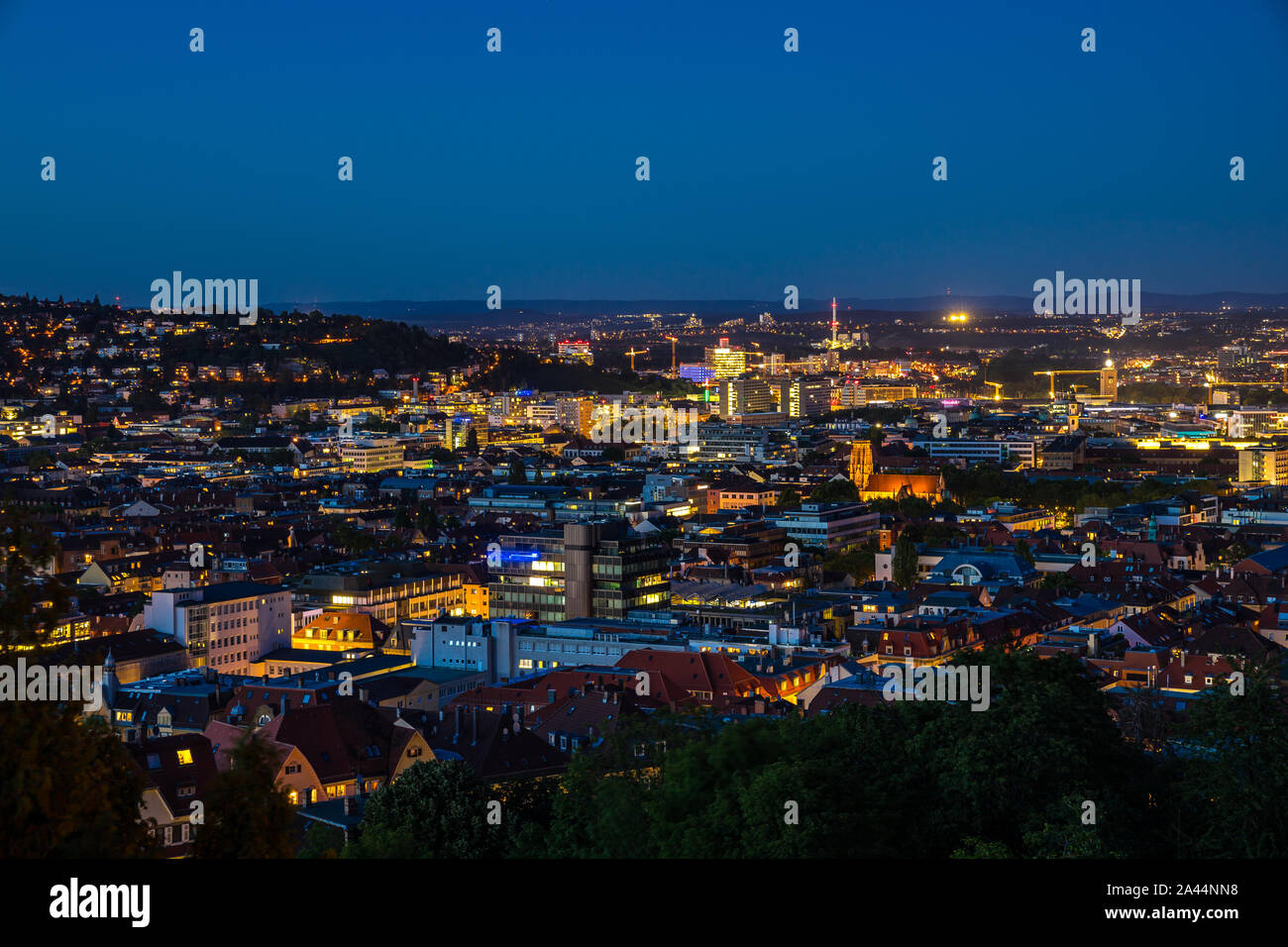 Germany, Illuminated magical skyline of downtown stuttgart city houses ...