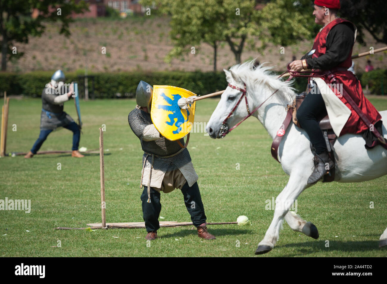 Crown Meadow, Evesham, Worcestershire, UK. 8th August, 2015. Pictured:  Reenactors show off their horsemanship skills at the 750th anniversary of the Stock Photo