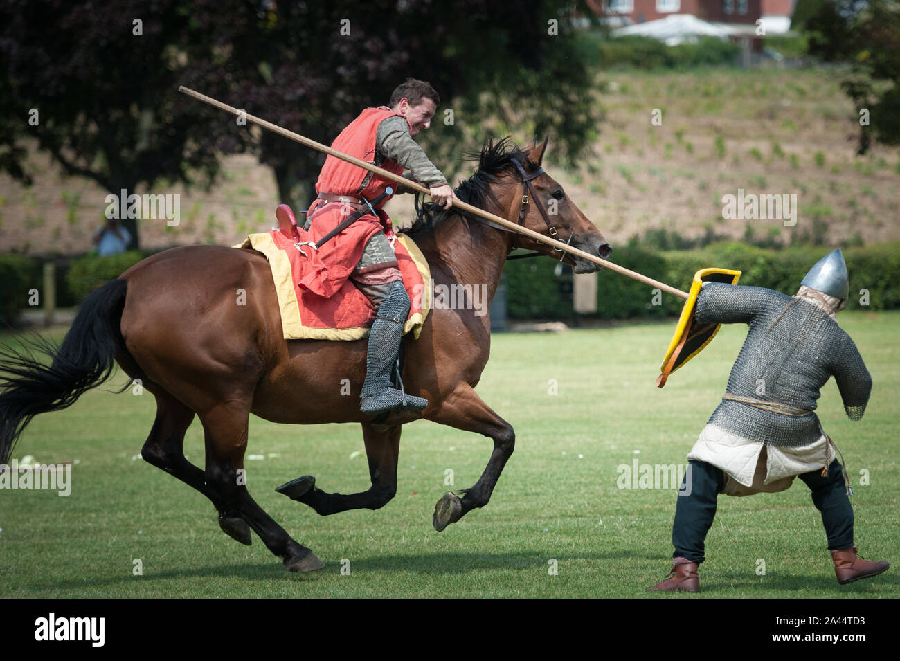 Crown Meadow, Evesham, Worcestershire, UK. 8th August, 2015. Pictured:  Reenactors show off their horsemanship skills at the 750th anniversary of the Stock Photo